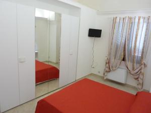 A bed or beds in a room at Casa Gianni