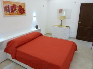 A bed or beds in a room at Casa Gianni