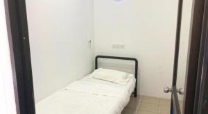 Ένα ή περισσότερα κρεβάτια σε δωμάτιο στο SPOT ON 90077 Cherry's Lodge +17 φωτογραφίες