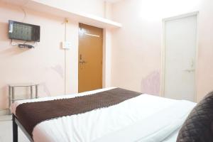 Un televizor și/sau centru de divertisment la Hotel Naman Executive - 2