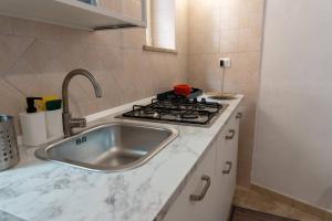 Kuchyň nebo kuchyňský kout v ubytování La Casa dei Sogni - Comfort nel Cuore di Gaeta