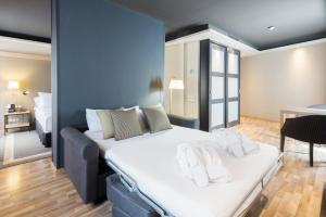 Ein Bett oder Betten in einem Zimmer der Unterkunft Hotel Jazz