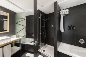 Ein Badezimmer in der Unterkunft Hotel Jazz