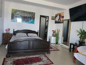 Ένα ή περισσότερα κρεβάτια σε δωμάτιο στο Casa Rico 2