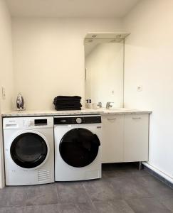 Η κουζίνα ή μικρή κουζίνα στο Appartement deux pièces refait à neuf parking et wifi