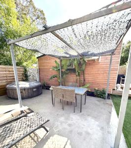 Patio nebo venkovní prostory v ubytování L’Écrin Lumineux
