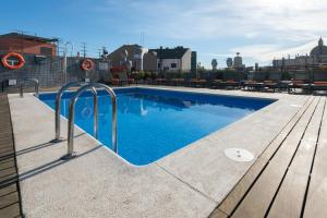 Der Swimmingpool an oder in der Nähe von Hotel Jazz