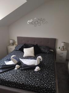 Postel nebo postele na pokoji v ubytování Apartman Mali raj