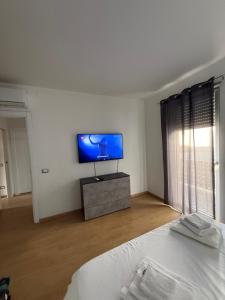 TV a/nebo společenská místnost v ubytování Civico 2 Olbia