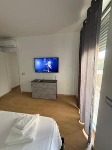 TV a/nebo společenská místnost v ubytování Civico 2 Olbia + 43 fotografií