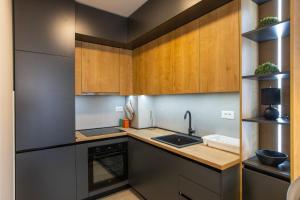 Kuhinja ili čajna kuhinja u objektu Floret Suite