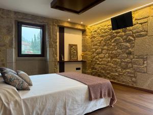 Postel nebo postele na pokoji v ubytování Casa con barbacoa · Casa Amelia by Easy Life Rent + 67 fotografií