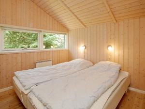 Giường trong phòng chung tại Luxury Spa Retreat by Golf - By Traum Ferienwohnungen