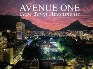 een skyline van een stad 's nachts met de woorden verzekering één kaapstad appartementen bij Avenue One Apartments in Kaapstad