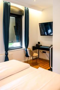 Postel nebo postele na pokoji v ubytování Nikii Boutique Hotel