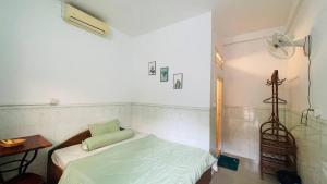 Ένα ή περισσότερα κρεβάτια σε δωμάτιο στο Studebaker Guesthouse