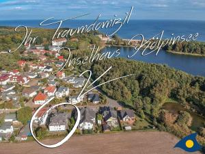 an aerial view of a town next to the water at Inselhaus Whg 03 in Stubbenfelde