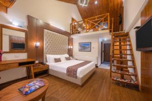 Postel nebo postele na pokoji v ubytování Snow Valley Resorts & Spa Manali