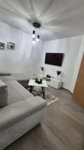 Un televizor și/sau centru de divertisment la Be Chill Apartment
