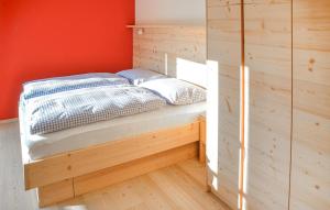 Ένα ή περισσότερα κρεβάτια σε δωμάτιο στο 2 Bedroom Gorgeous Apartment In Ellmau