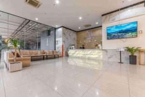 Χώρος καθιστικού στο Elong WG international hotel艺龙万国酒店