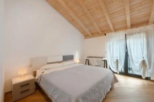 Postel nebo postele na pokoji v ubytování La Casa Di Batman