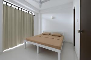 Postel nebo postele na pokoji v ubytování 2-Bedroom Stay in Colombo 05