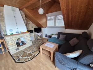 an overhead view of a living room with a fireplace at FeWo 1 Rolf Koglin in Gunzenhausen