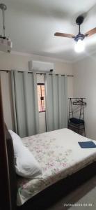 Katil atau katil-katil dalam bilik di Resort Privado, Piscina, Fliperama, Cinema e Mesa de Bilhar