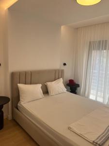 Ένα ή περισσότερα κρεβάτια σε δωμάτιο στο New apartment +23 φωτογραφίες