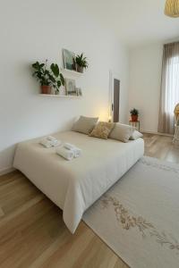 Postel nebo postele na pokoji v ubytování Dolce Nest