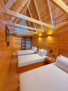 Ένα ή περισσότερα κρεβάτια σε δωμάτιο στο Navy Inn & Bungalows +176 φωτογραφίες