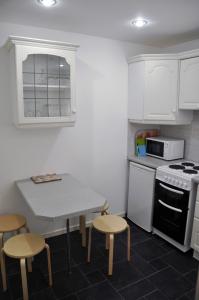 Кухня або міні-кухня у Eaglesfield House Guest Apartment