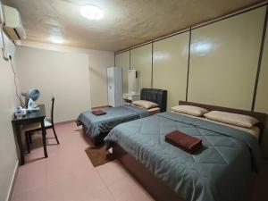 Una cama o camas en una habitación de HotelChanglun