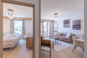 Posezení v ubytování Alpe d'Huez Houses - Chez Côme, Nid douillet dans résidence Spa 5 étoiles, skis au pied, avec vue et jardin + 43 fotografií