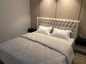 Postel nebo postele na pokoji v ubytování Entire Apartment شقه مستقله خاصه