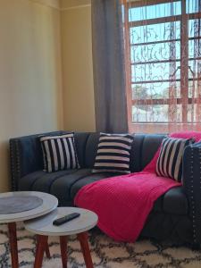 Posezení v ubytování Okoko Enterprises BnB