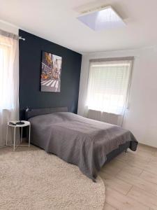 Postel nebo postele na pokoji v ubytování Urban City Room - Self Check In - Bad Nauheim