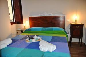 Giường trong phòng chung tại San Martino 100 Old Town Apartment - Itri
