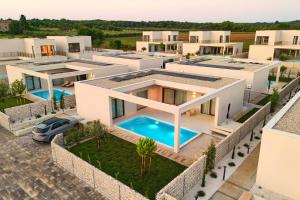 an aerial view of a villa with a swimming pool at Taria Resort in Poreč
