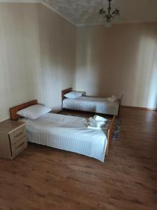 Ένα ή περισσότερα κρεβάτια σε δωμάτιο στο Mase guest house