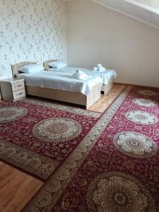 Ένα ή περισσότερα κρεβάτια σε δωμάτιο στο Mase guest house