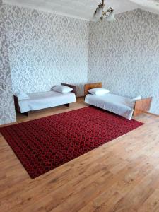 Ένα ή περισσότερα κρεβάτια σε δωμάτιο στο Mase guest house