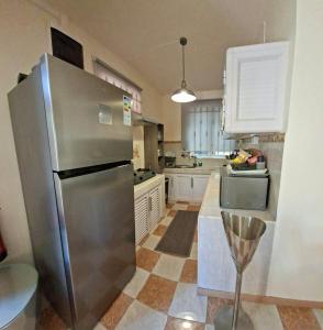 Η κουζίνα ή μικρή κουζίνα στο Villa Maloya - Appartment Grand Bay