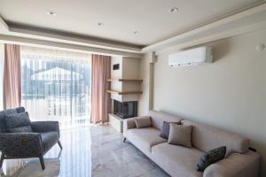 Χώρος καθιστικού στο Villa The Bay