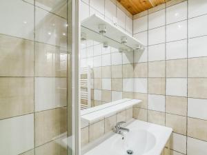 a bathroom with a sink and a mirror at Studio cabine 5 personnes à Arc 1600, ski aux pieds, proche commerces, wifi gratuit - FR-1-411-361 in Arc 1600