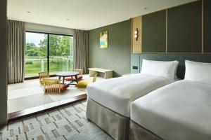 เตียงในห้องที่ ANA Holiday Inn Resort Karuizawa by IHG +83 ภาพ