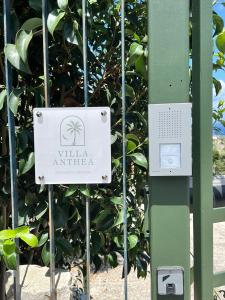 a sign that says villa antica in front of a tree at Villa Anthea - Relax vista mare tra Palermo e Cefalù in Trabia +9 photos