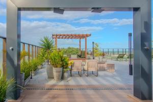 Balkoni atau teres di Flat pé na areia Get Sense - MyFlats Hospedagens