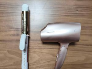 a knife and a hair dryer sitting on a table at 釜炒り茶の宿陽だまりTraditional Japanese house near Kumano Kodo and Nachi Falls with parking bikes garden and onsite tea house in Nachikatsuura